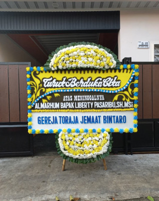 Papan Bunga Duka di Utara