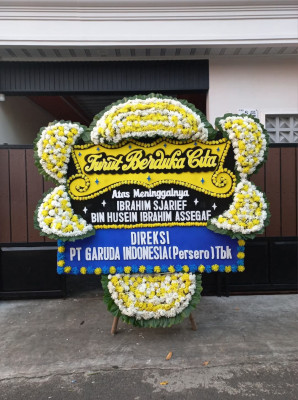 Papan Bunga Duka di Utara